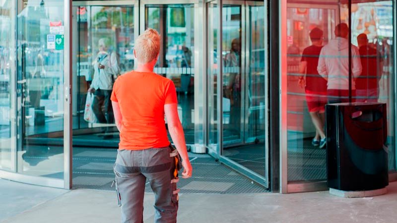 woman-technician-walking-entrance